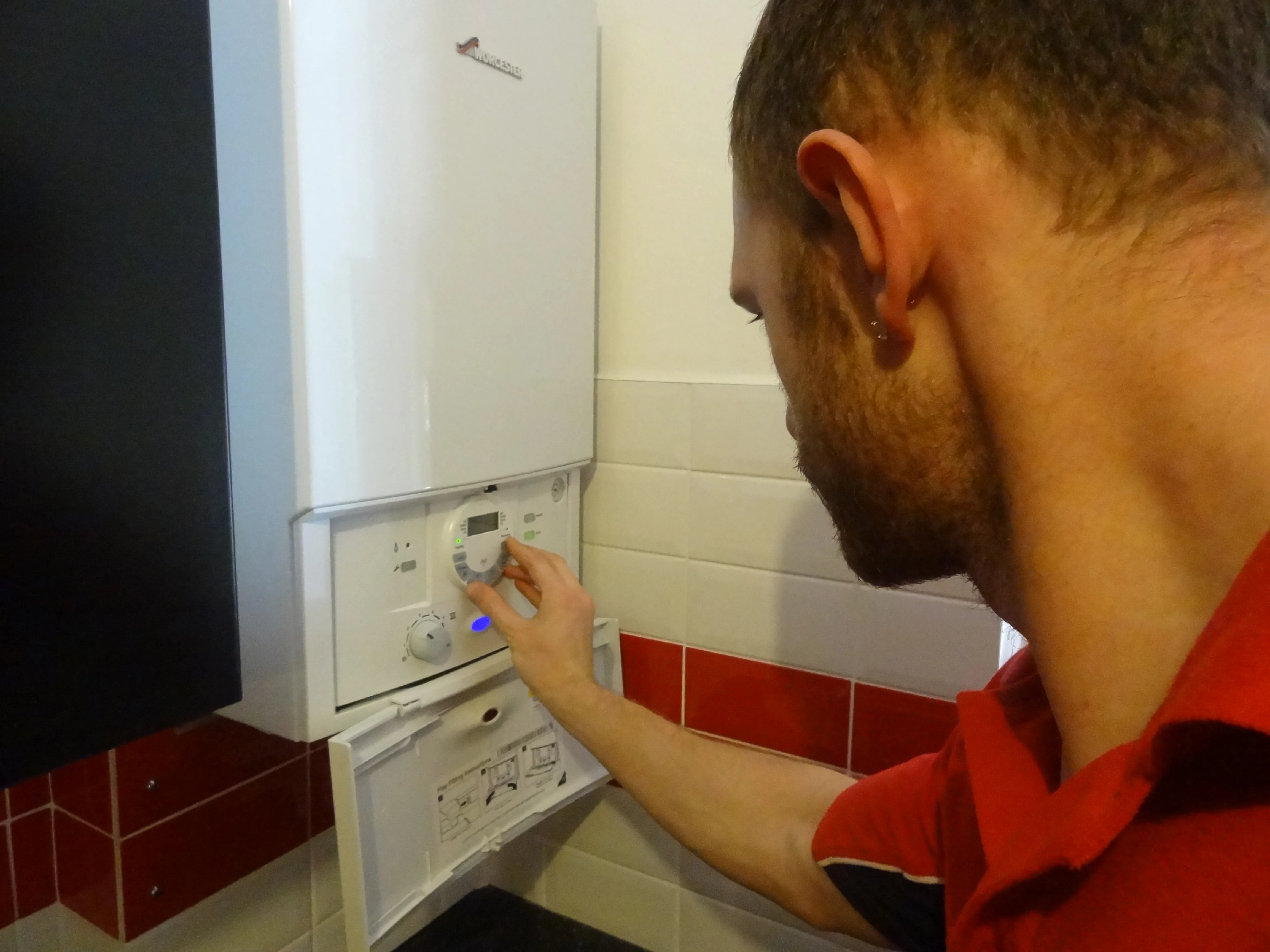 Richmond Plumbers 247 engineer working on a boiler installation in Richmond